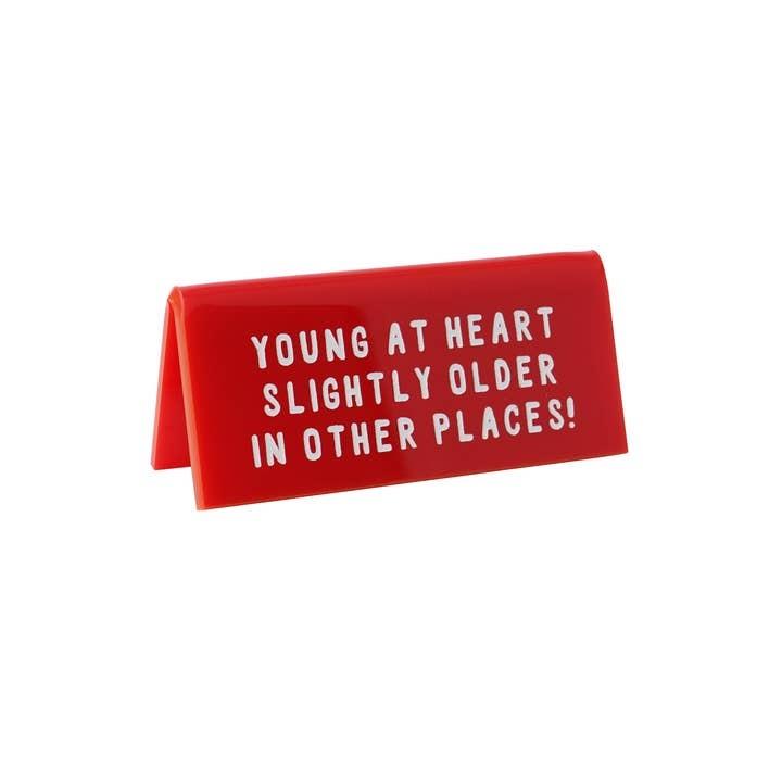 'Young At Heart' Red Desk Sign